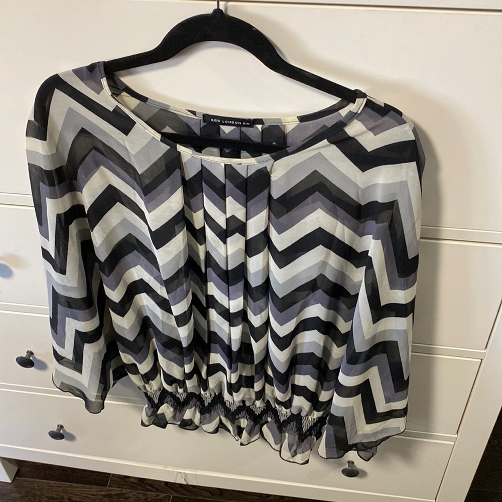 Wing sleeved blouse with cinched waist